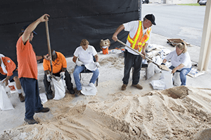 People filling up sandbags